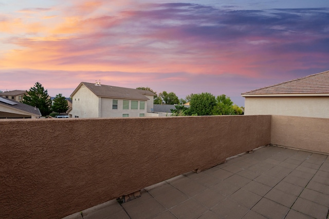 view of patio terrace at dusk