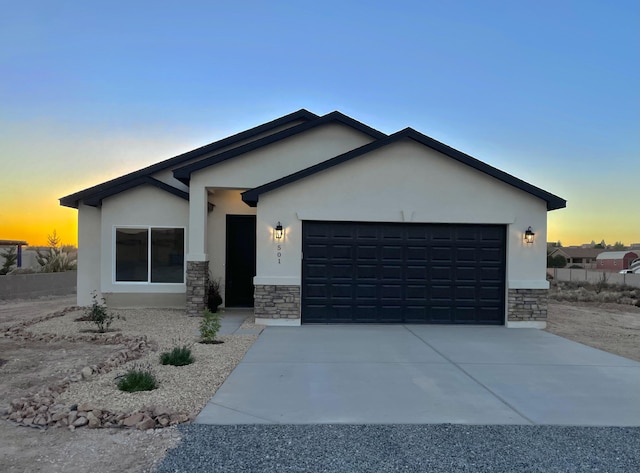 view of front of property featuring a garage