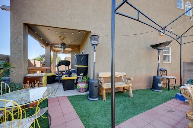 view of patio / terrace with ceiling fan