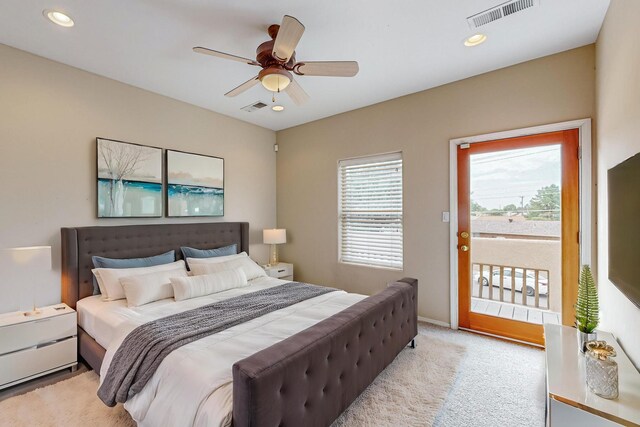 carpeted bedroom with access to outside and ceiling fan