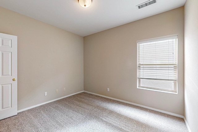 view of carpeted spare room