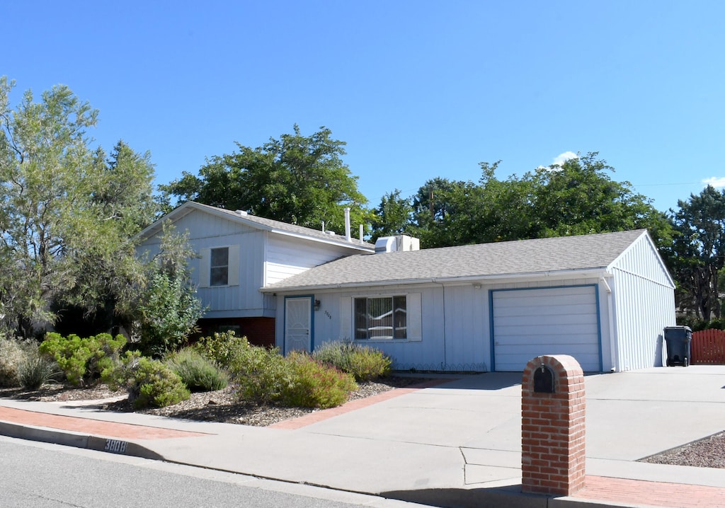 split level home featuring a garage