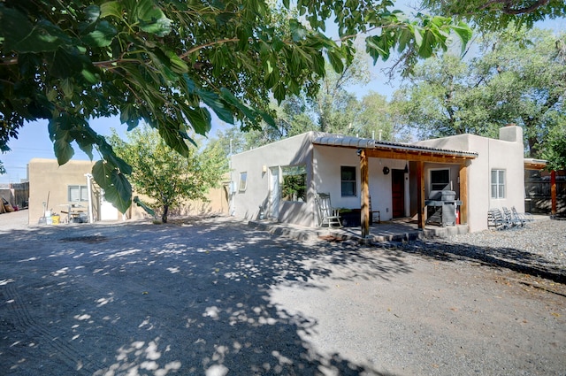 view of pueblo revival-style home