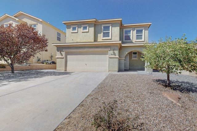 view of front of property featuring a garage