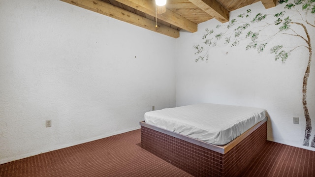 bedroom with dark carpet, beamed ceiling, wood ceiling, and ceiling fan