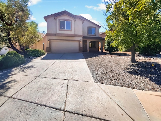 front of property with a garage