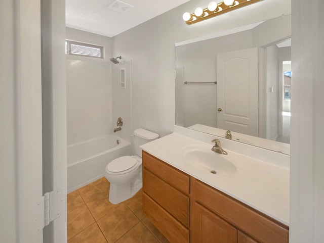 full bathroom featuring tile patterned floors, vanity, bathtub / shower combination, and toilet