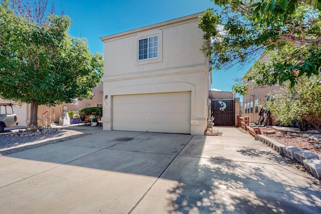 front of property with a garage