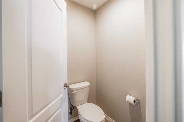 bathroom featuring toilet