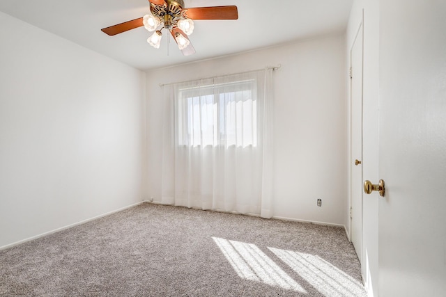 unfurnished room featuring carpet floors and ceiling fan