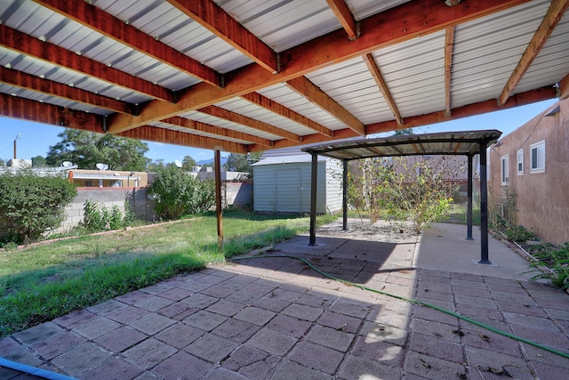 view of patio featuring a shed