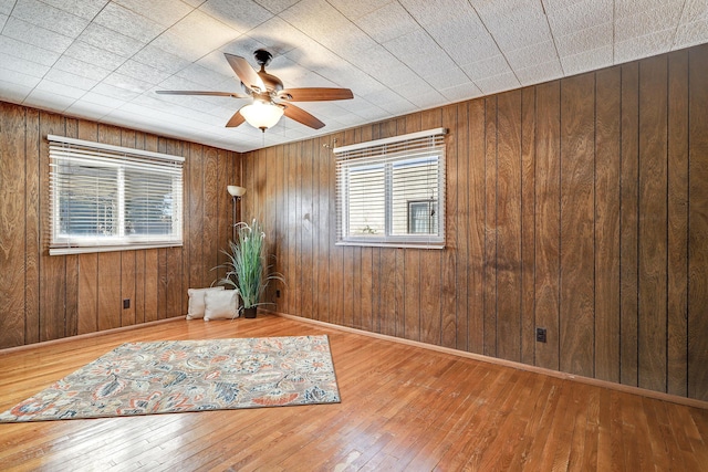 interior space featuring ceiling fan and wood-type flooring