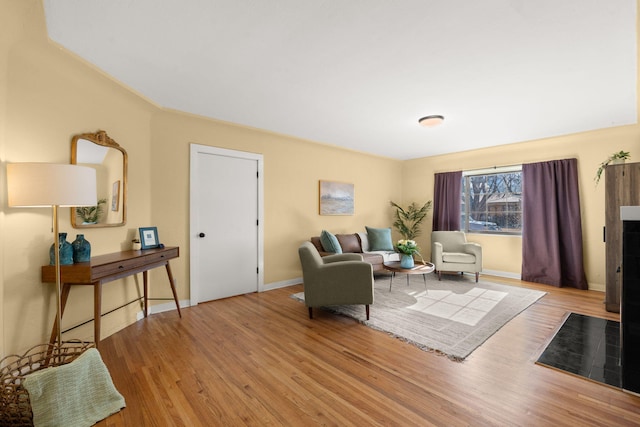 living room with light hardwood / wood-style floors