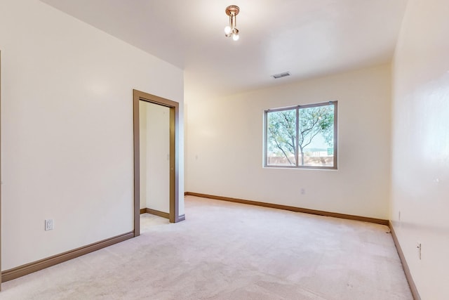 view of carpeted spare room