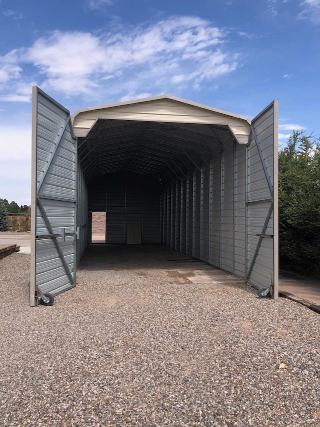 view of outdoor structure with a carport