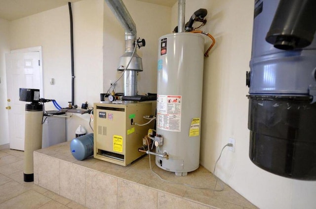 utility room featuring gas water heater