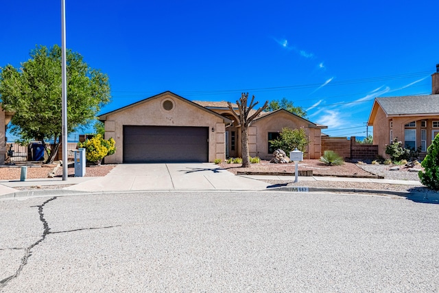 single story home featuring a garage