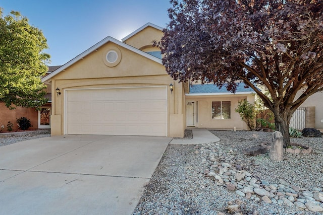 single story home featuring a garage