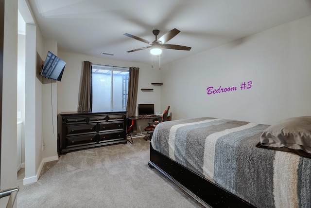 carpeted bedroom with ceiling fan