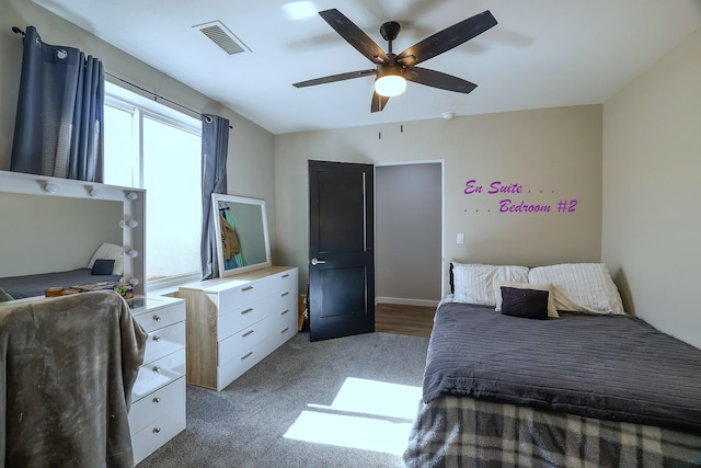 carpeted bedroom with ceiling fan