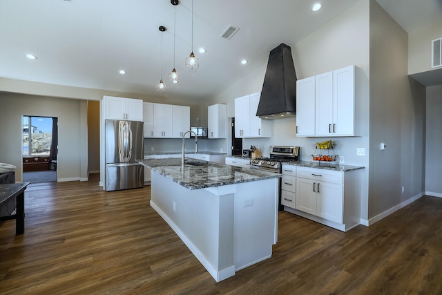 kitchen featuring white cabinets, an island with sink, stainless steel appliances, and dark hardwood / wood-style flooring