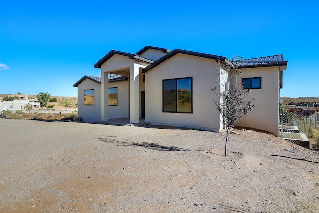 view of front of home featuring a patio area