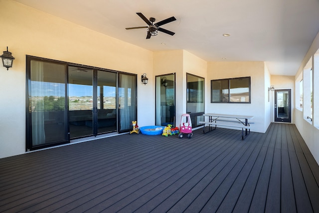 wooden terrace with ceiling fan