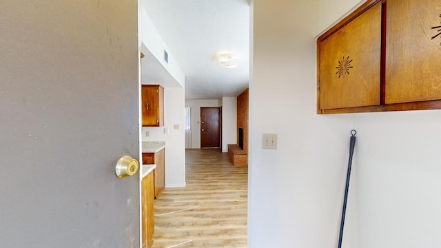 hallway featuring light hardwood / wood-style flooring