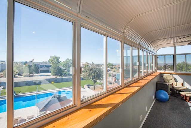 sunroom featuring a wealth of natural light