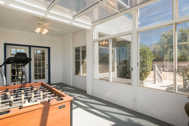 exterior space featuring ceiling fan