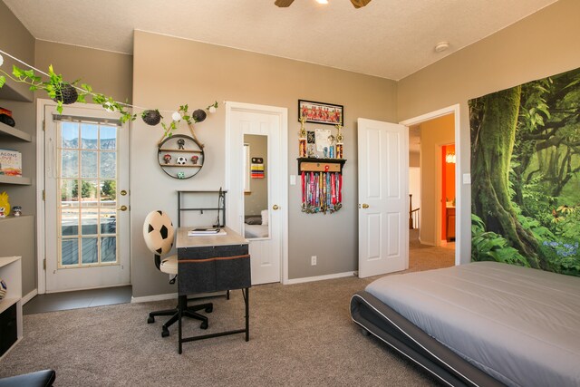 bedroom featuring ceiling fan, a textured ceiling, access to exterior, and carpet flooring