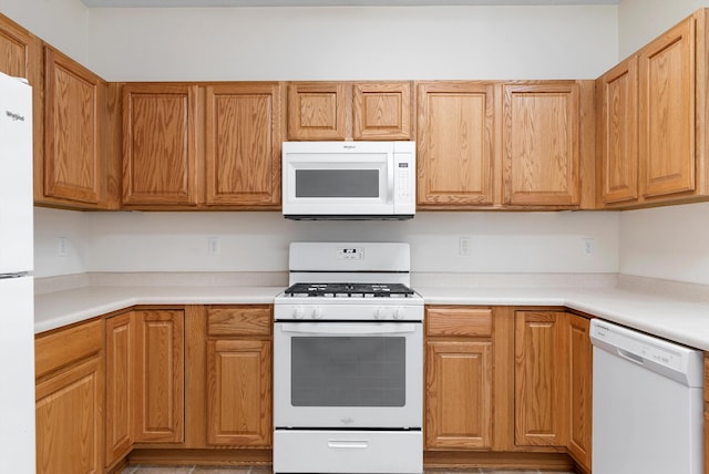 kitchen featuring white appliances