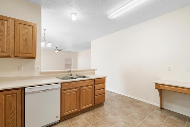 kitchen with dishwasher, a textured ceiling, sink, light tile patterned floors, and ceiling fan