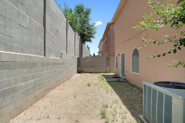 view of yard featuring central AC