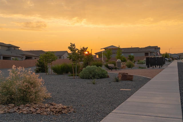 view of yard featuring a residential view and fence