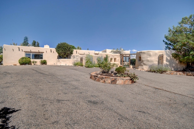 view of adobe home