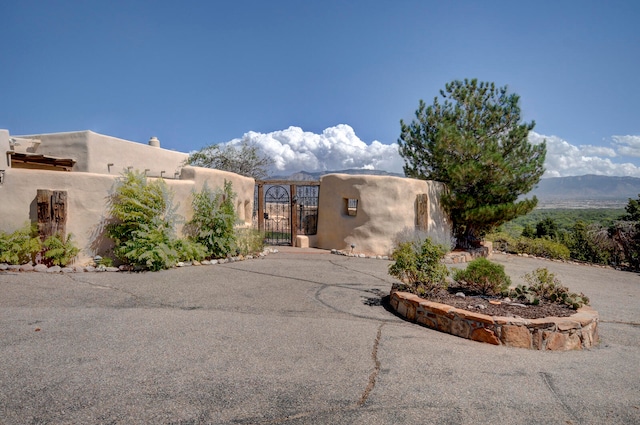 view of front facade featuring a mountain view