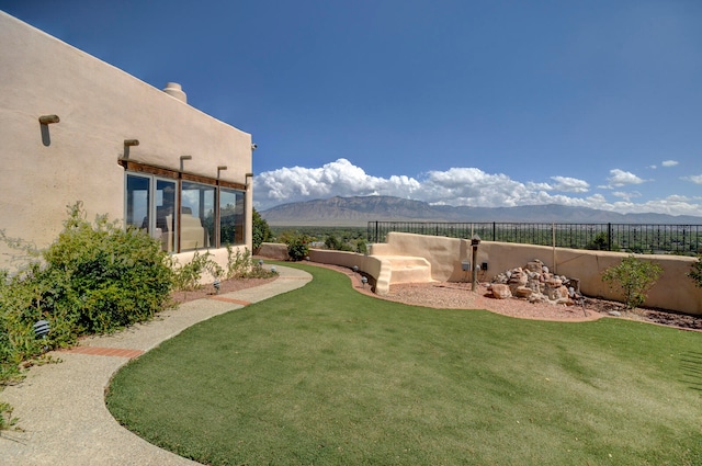 view of yard with a mountain view