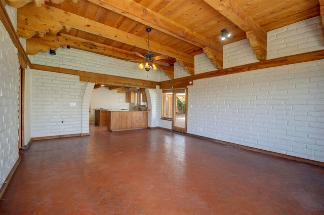 unfurnished living room with brick wall, beamed ceiling, wooden ceiling, and ceiling fan