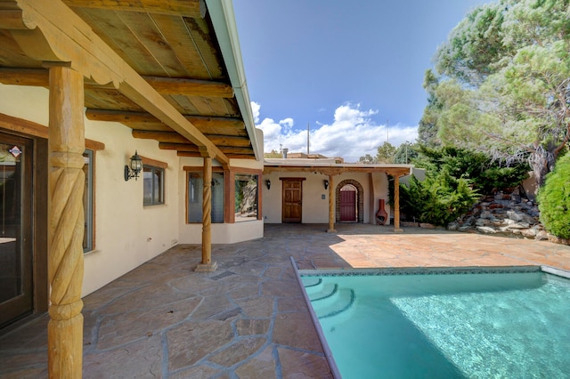 view of pool featuring a patio area