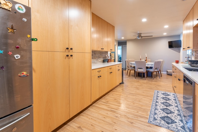 kitchen with decorative backsplash, light brown cabinetry, ceiling fan, light hardwood / wood-style flooring, and stainless steel dishwasher