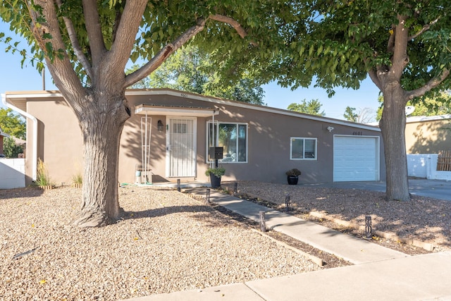 4601 Palo Duro Ave NE, Albuquerque, NM 87110 - single story home with a garage and stucco siding