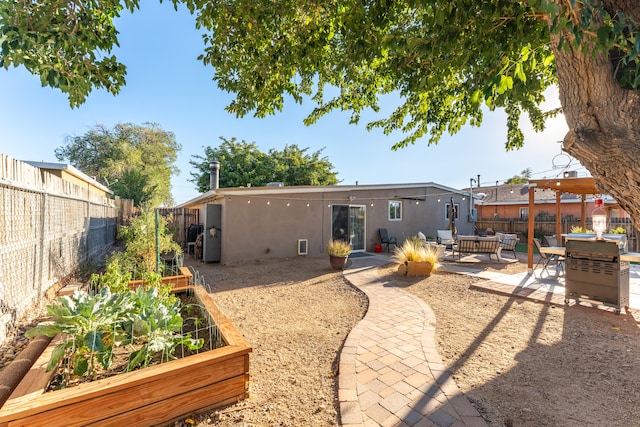 back of property featuring a patio