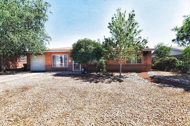 single story home featuring a garage