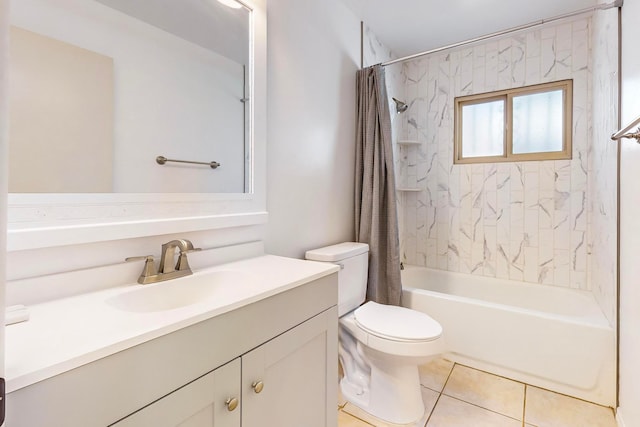 full bathroom with vanity, tile patterned floors, toilet, and shower / bath combo