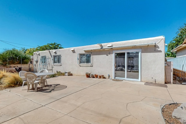 back of house featuring a patio area