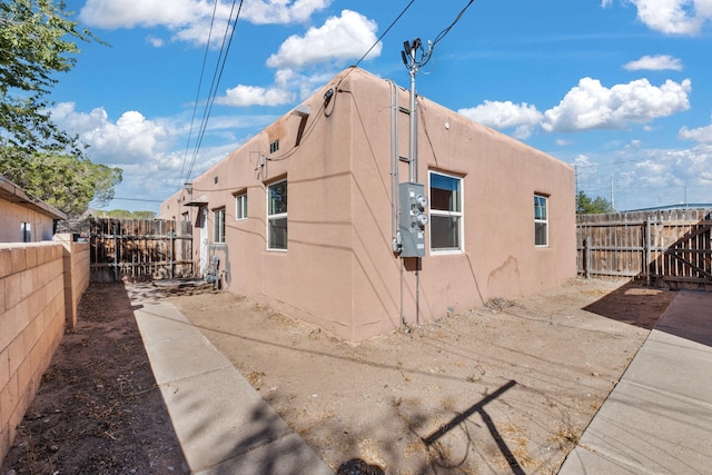 view of property exterior featuring a patio