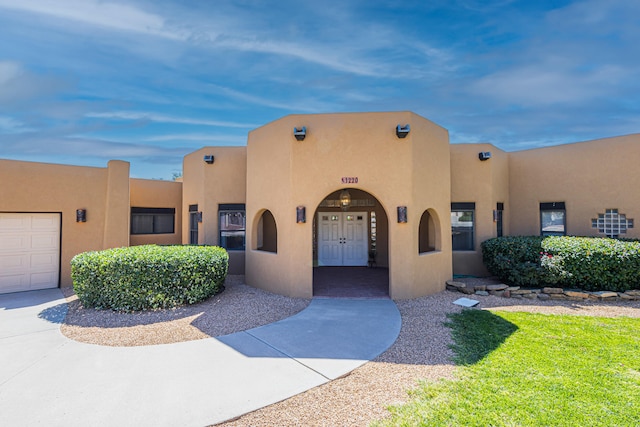 adobe home with a garage