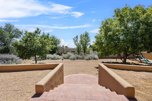 view of yard with a playground