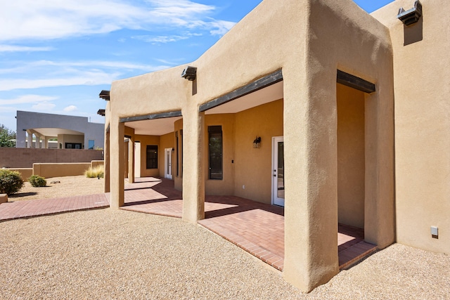 rear view of house with a patio area